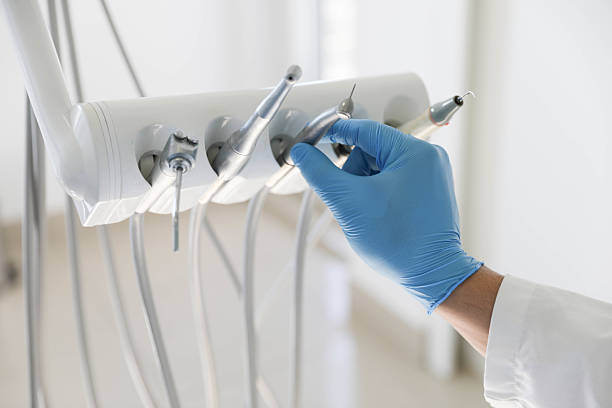 Professional Emergency Dentist technician working in Half Moon, NC
